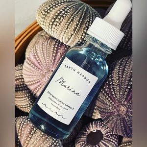 Earth Harbor Marina face oil